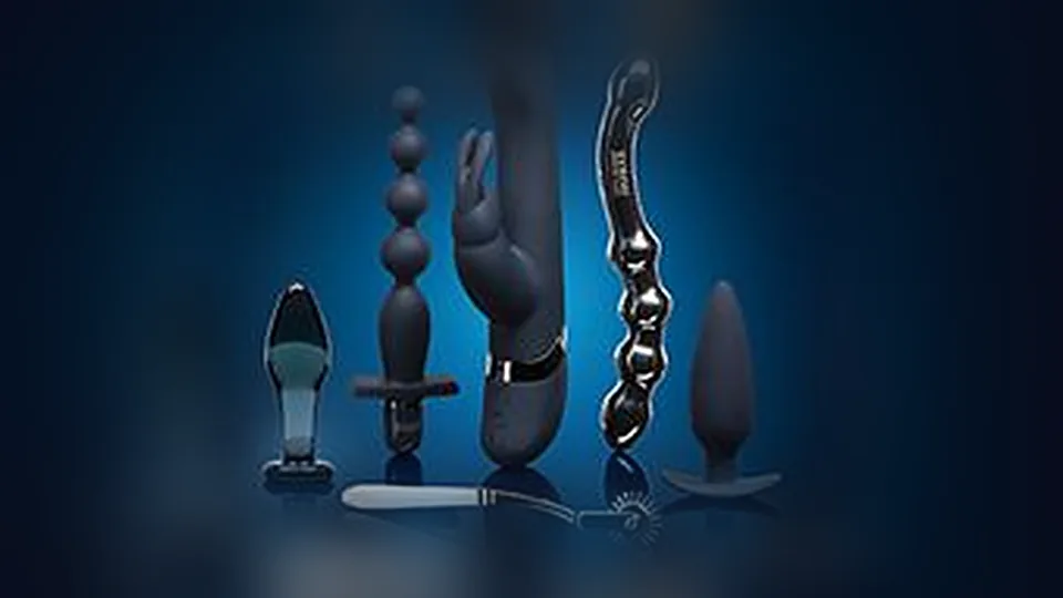 Black toys: glass plug, beads, vibrators and a steel wand